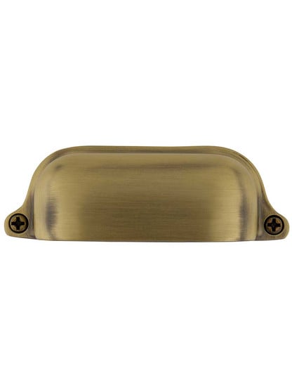 Traditional Solid-Brass Cup Pull 3 1/2 inch Center-to-Center in Antique Brass.